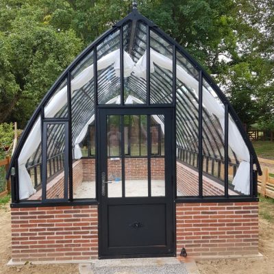 Réalisation d’une serre à l’ancienne sur muret- St Philibert sur Risle – (27 – Eure)